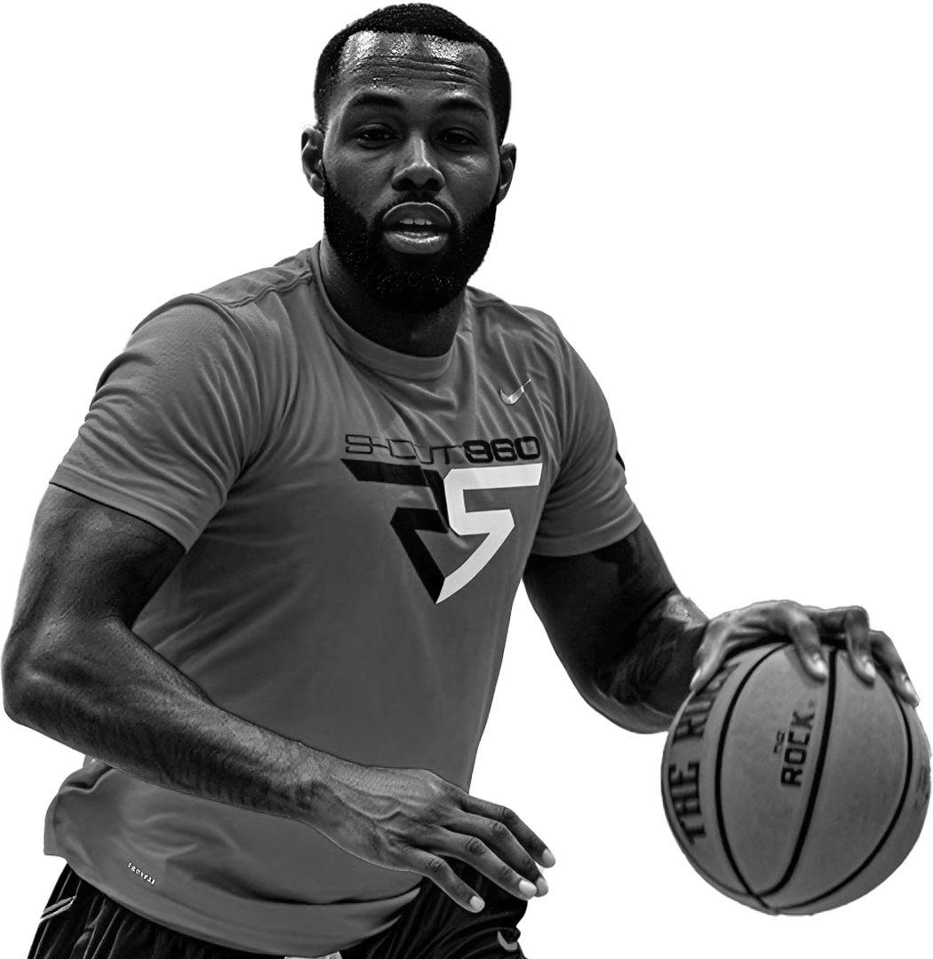 Rodney Stuckey dribbling a basketball while wearing a Rodney Stuckey t-shirt